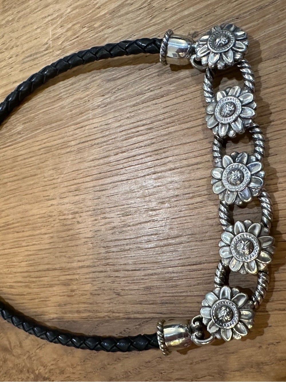 Braided Black Leather Necklace with Silver tine Floral Accents